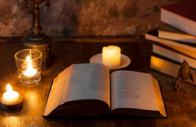 Old books and lantern
